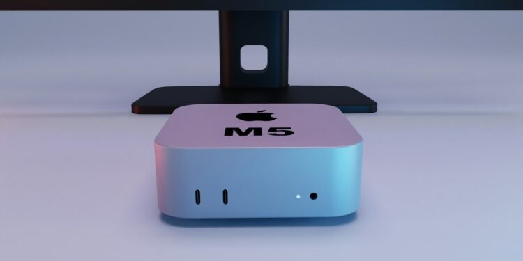 Monitorun altinda Apple logolu M5 yazili kompakt mini bilgisayar ve masaustu.