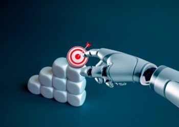 Robot eli küp bloğun üzerindeki hedef işaretine dokunuyor.