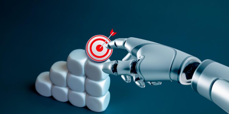 Robot eli küp bloğun üzerindeki hedef işaretine dokunuyor.